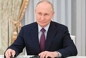 Putin signs into law strategic agreement with Iran