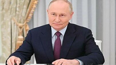 Putin signs into law strategic agreement with Iran