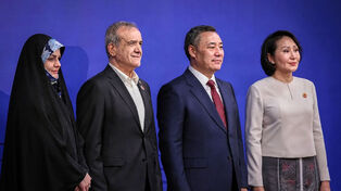 One Trip, Several Messages: What Lies Beyond the Shanghai Frame?