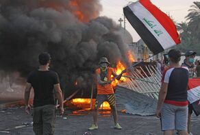 العراق.. اتخاذ إجراءات ضد المخربين.. واتهامات لأميركا ودول عربية بإشعال الشارع