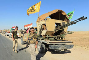 الحشد الشعبي يواصل حربه ضد داعش رغم اعتداءات امريكا